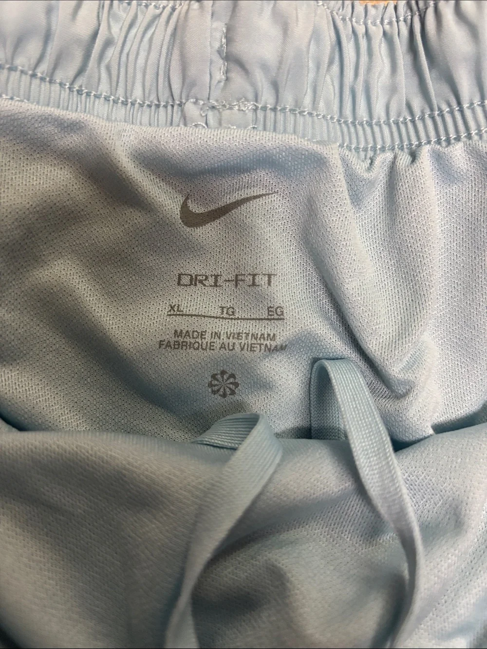 Nike - Women’s Sky Blue Athletic Shorts with Navy Trim (size X-Large)